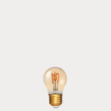Dulora 4W Vintage Fancy Round LED Bulb E27 in Ultra Warm White with spiral filament visible through amber tinted glass