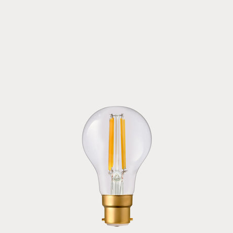 Dulora 6.5W GLS LED Bulb B22 Clear in Extra Warm White with filaments visible through clear A60 glass