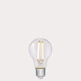 Dulora 6.5W GLS LED Bulb E27 Clear in Soft White glowing with crisp neutral light through clear A60 glass