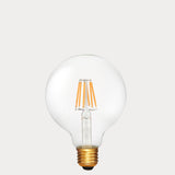 Dulora 6W E27 LED globe bulb in clear glass with 24V compatibility, shown unlit.